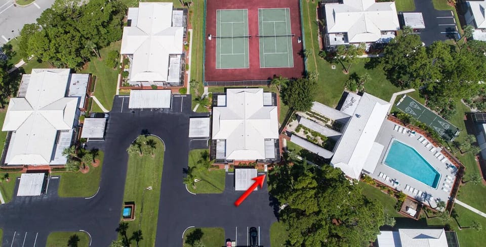 House is next to the clubhouse and pool