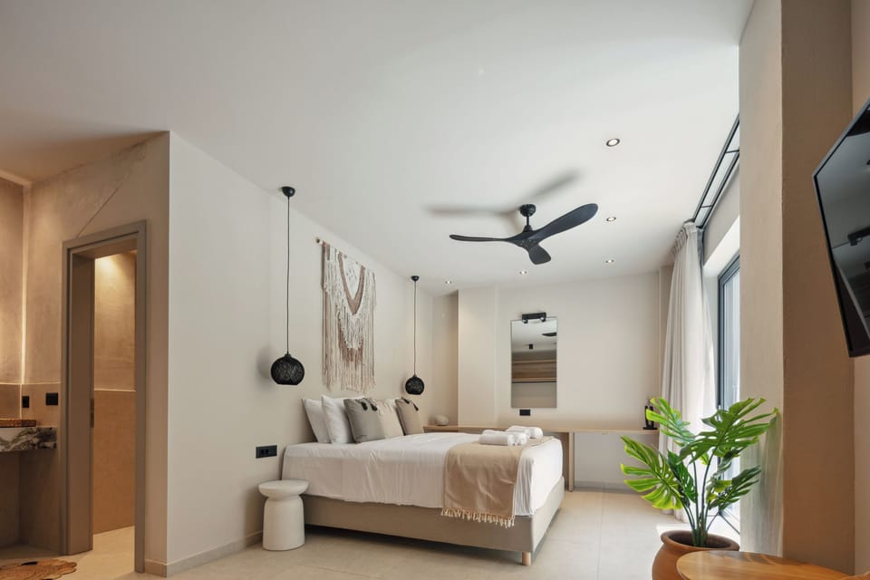 Bedroom with two twin size beds that can be joined together upon request, located on the lower floor