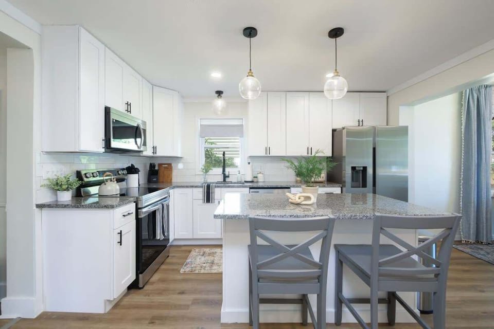 Bright kitchen w/ island & seating, perfect for casual meals