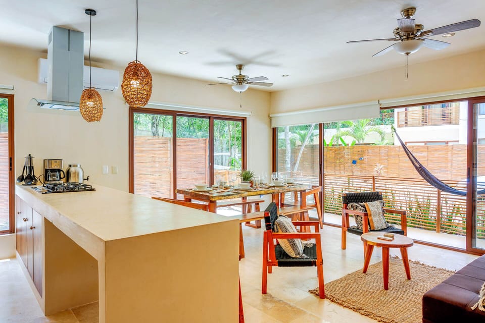 The open plan is even better with doors open to extend space to outdoors