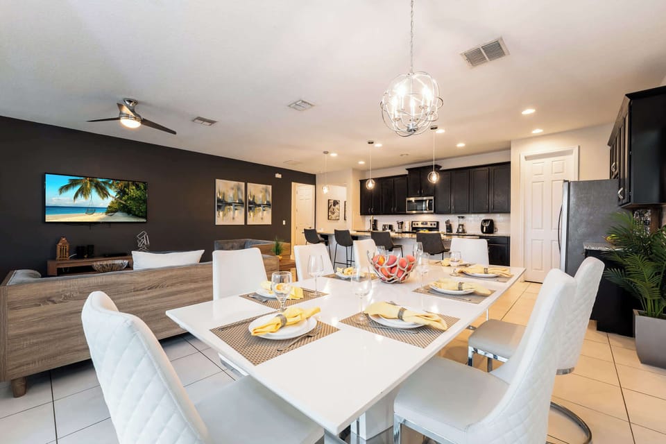 Spacious open-plan dining and kitchen area, ideal for family gatherings and entertaining in style.