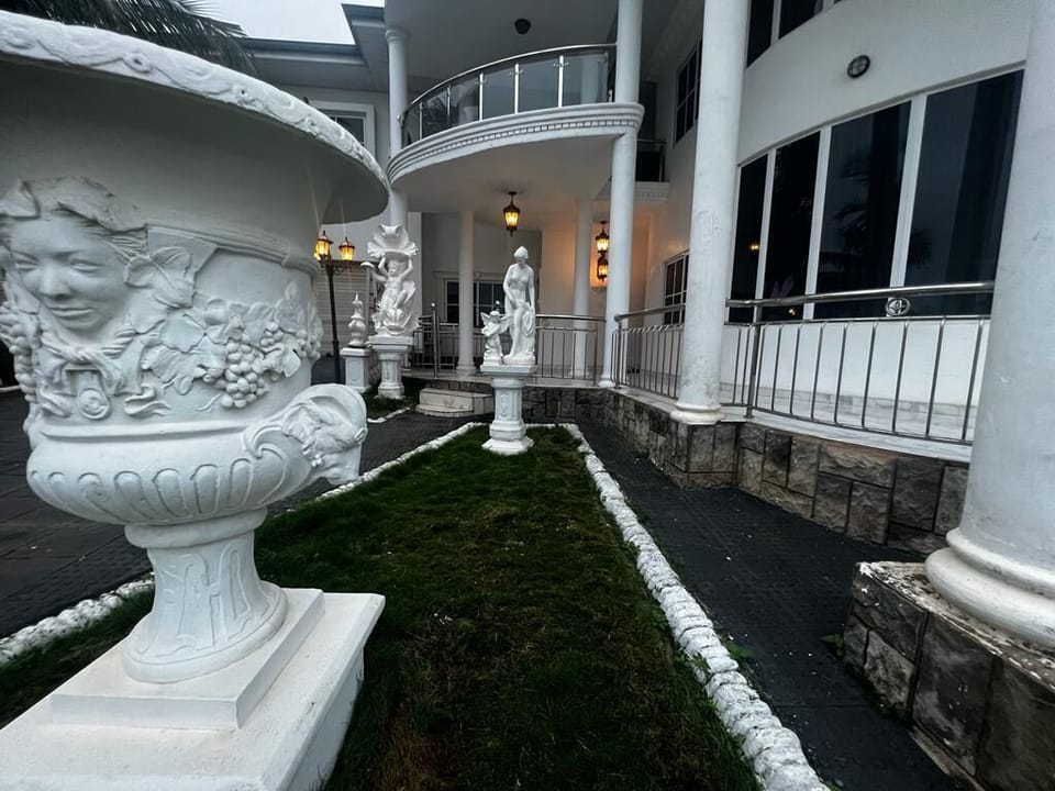 Front façade: The Peacock Mansion. 
