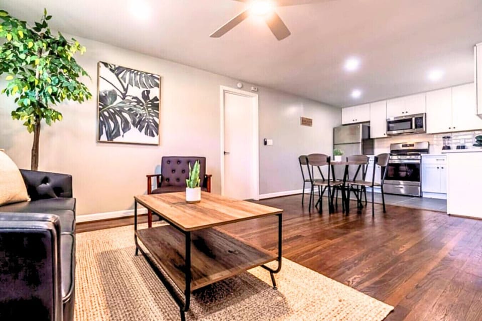 A comfortable spot to unwind, accented with greenery and thoughtful decor touches.