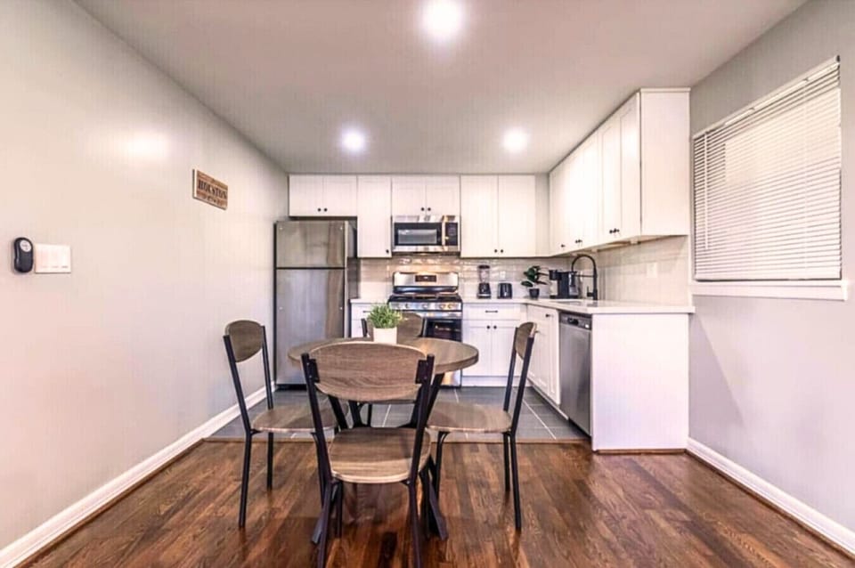 Bright and open kitchen with a cozy dining nook—great for meals at home.