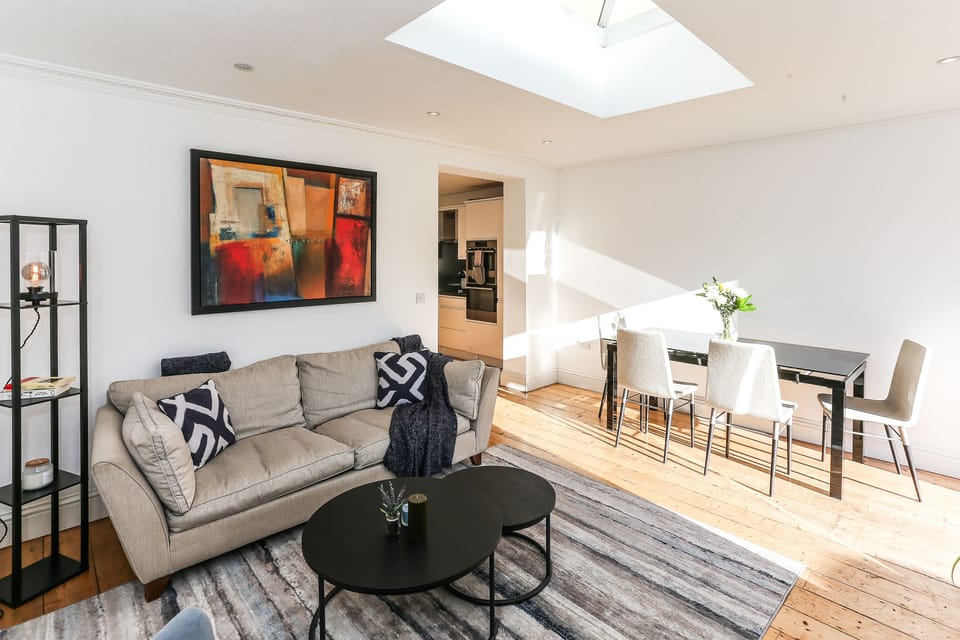Open Plan living room, dining and kitchen leading in to the garden