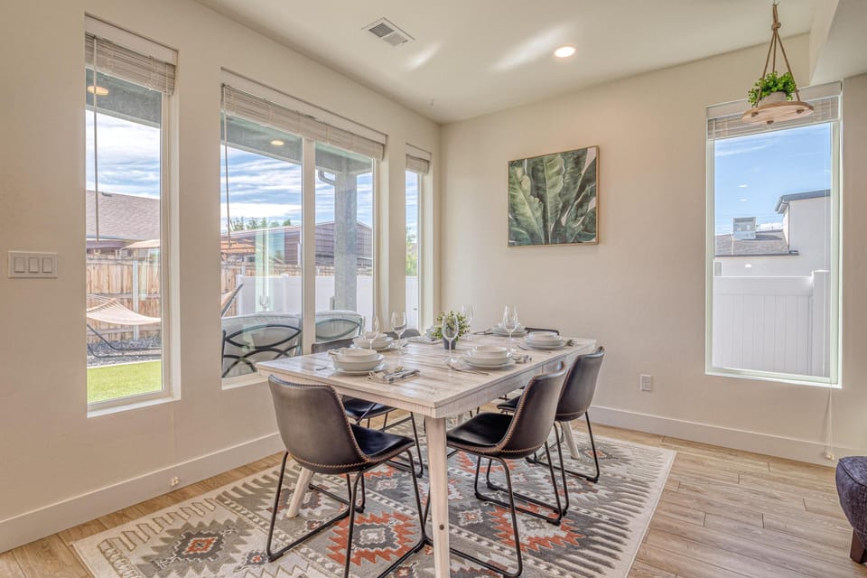 Modern dining room with plenty of seating for your whole group.