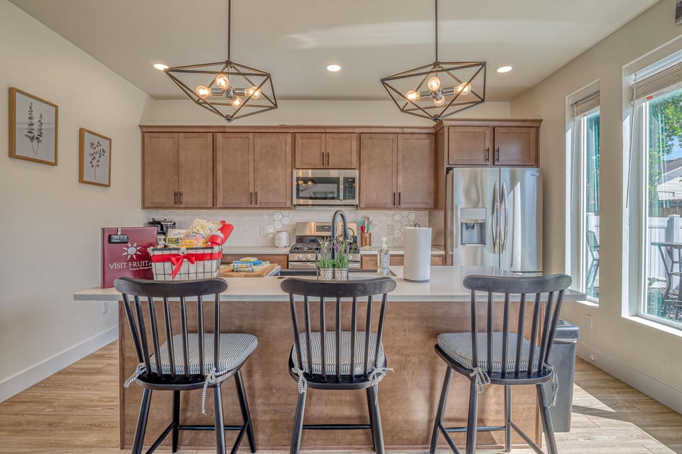 Enjoy cooking in a kitchen that blends functionality with modern design.