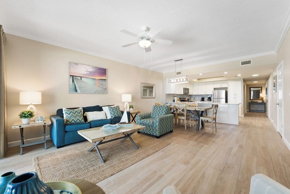 Unwind in your spacious open-concept living area with coastal-inspired decor and modern comforts throughout.