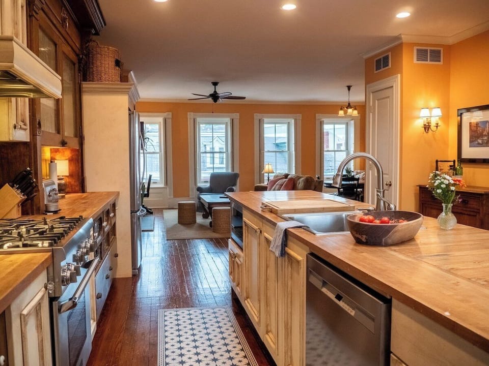 3rd floor open floor plan/ kitchen looking toward the living area