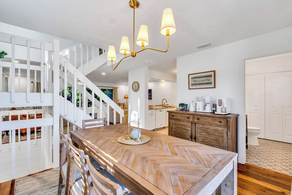 Dining Room with seating for 6. Coffee Bar in dining room featuring an Espresso machine, Drip Coffee Maker and water kettle. We also provide coffee beans, ground coffee, tea bags and assorted sweeteners. Enjoy! Today is a good day!