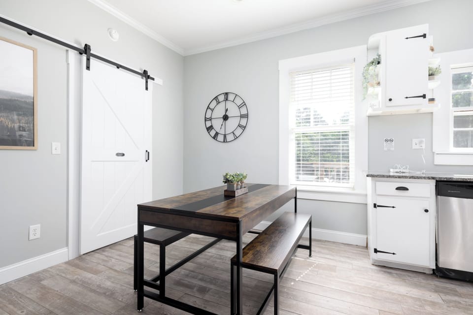 Spacious dining area just off the kitchen, perfect for family meals 