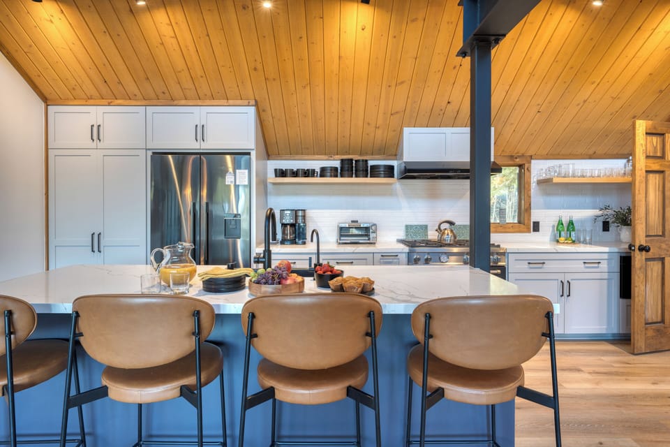 Barstool seating at the kitchen.