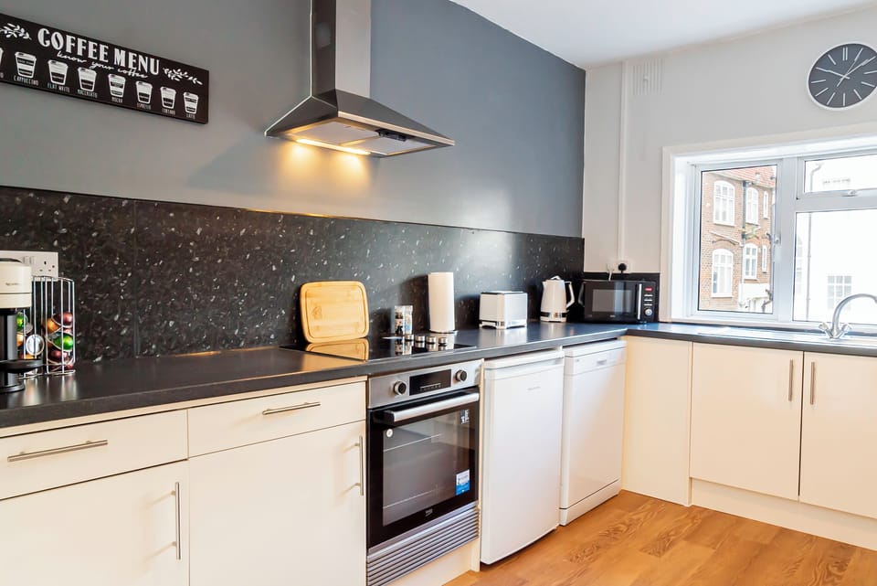 Fully equipped with everything you need to whip up a delicious meal, from pots and pans to utensils and dishes.