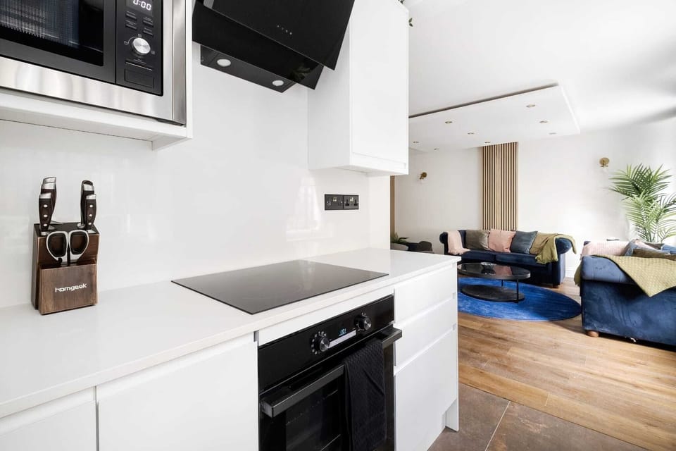 Step into the future of cooking with this modern kitchen, where innovative design and state-of-the-art appliances come together to create a stylish and efficient culinary haven