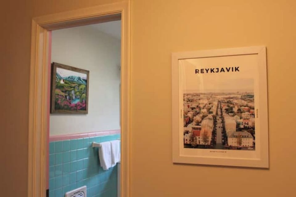 Original 1950s bathroom is a nod to the bright buildings in Reykjavik