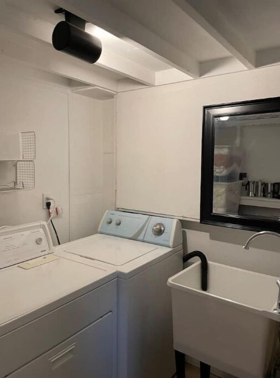 washer and dryer in the walk in closet in the unit.