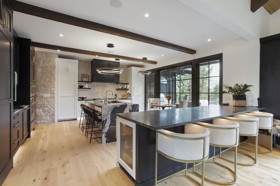 Plenty of seating in and around the kitchen for social time during cooking 