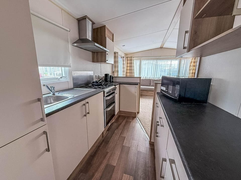 Bright, modern kitchen with scenic window views