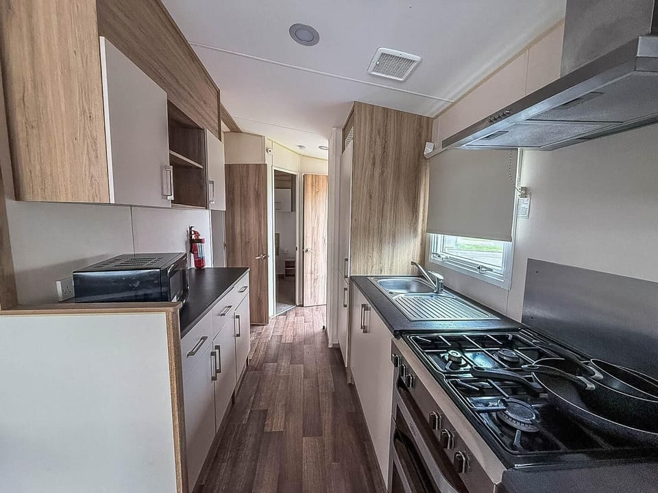 Modern kitchen with sleek appliances and ample storage