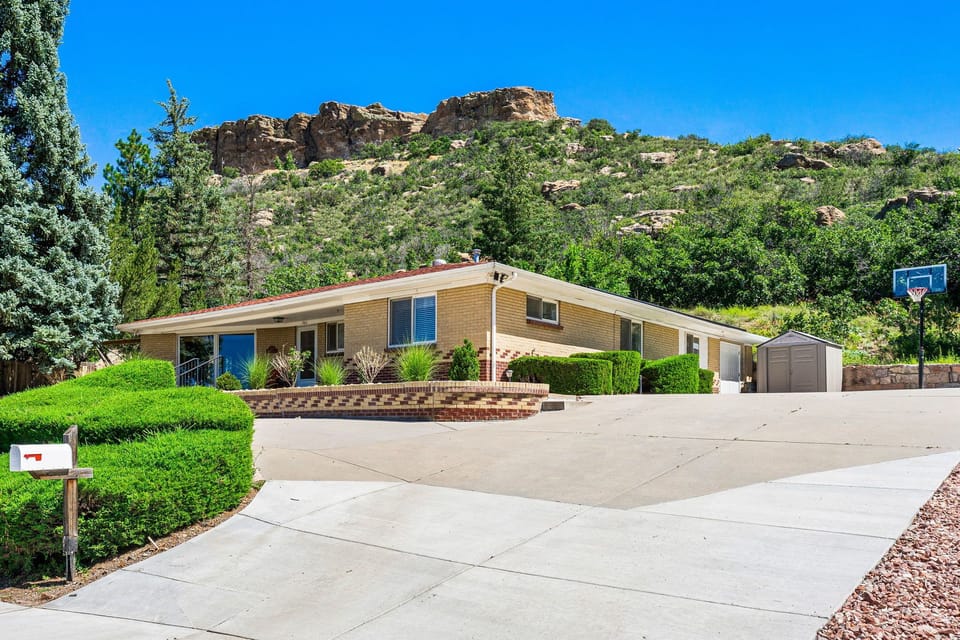 Front with "The Rock" of Castle Rock in the background.