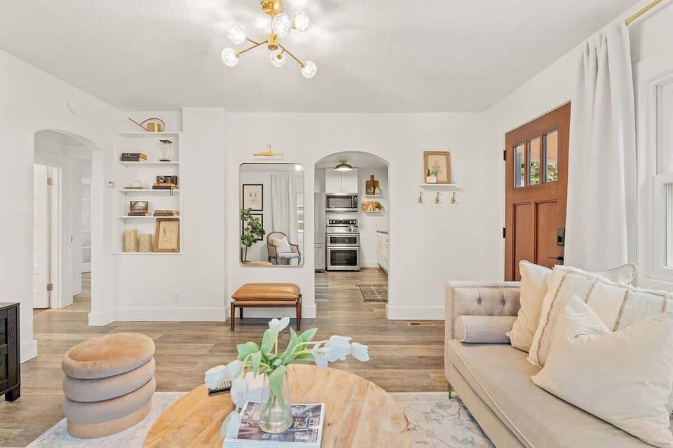 Arched doorway leads into the recently renovated designer kitchen. 