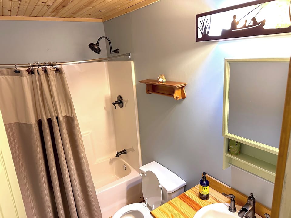 2nd floor bathroom with tub and shower.