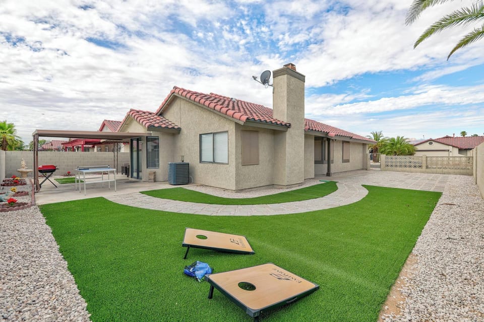 Spacious side/backyard with covered patio. Great for group gathering and family.