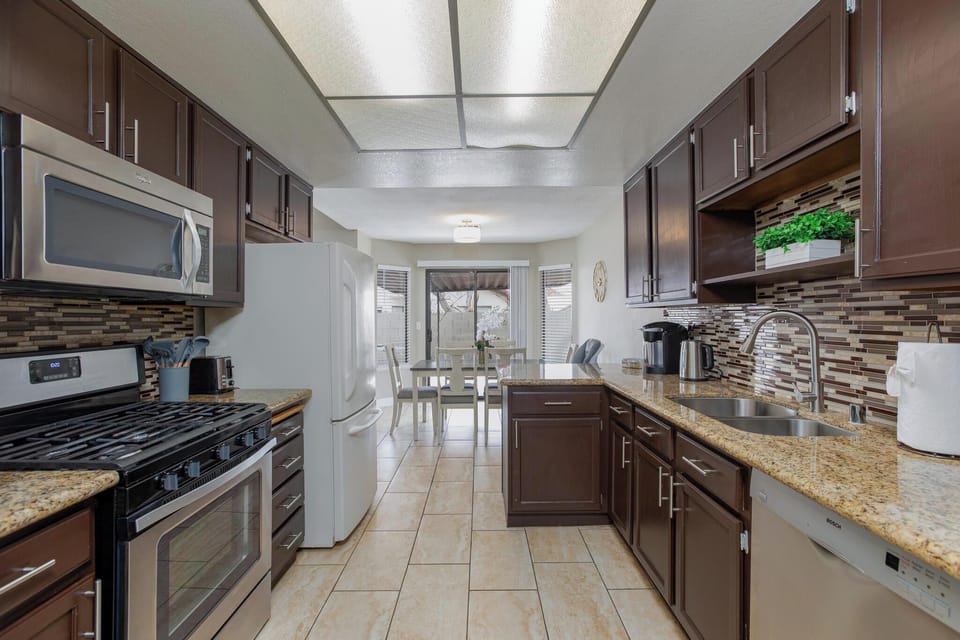 Fully equipped kitchen with all appliances, pots/pans, dishes, utensils, etc.