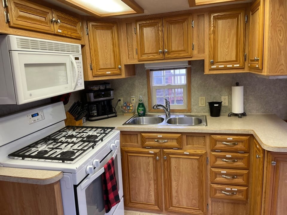 Fully stocked kitchen with gas stove