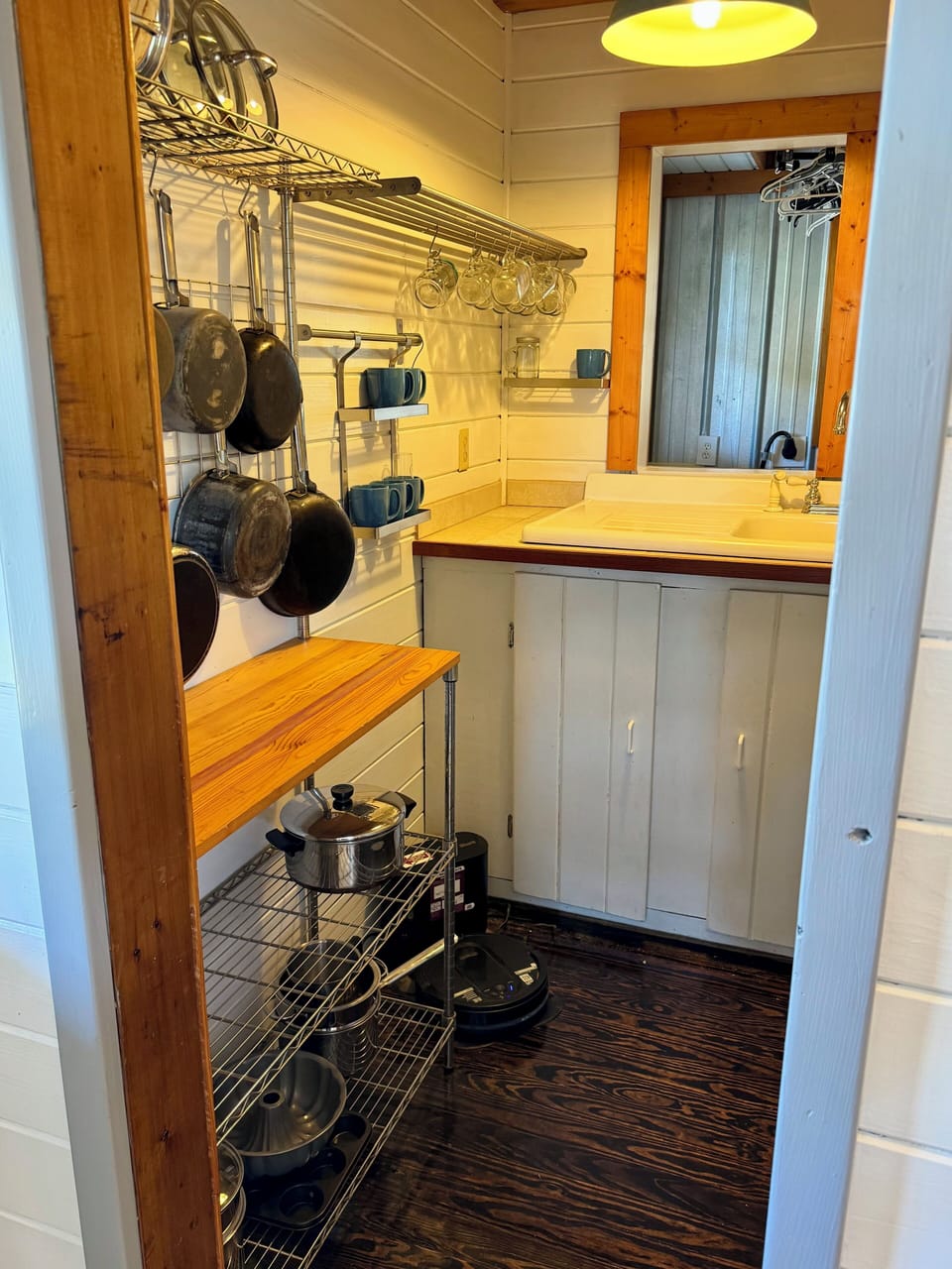 Full set of pots, pans, storage containers.