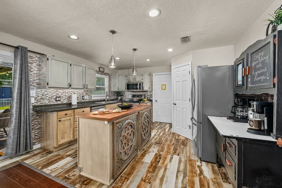 Enjoy culinary adventures in our fully stocked and well-equipped kitchen with a spacious island. Ample pantry & fridge space, along with complimentary spices, make cooking a joy.