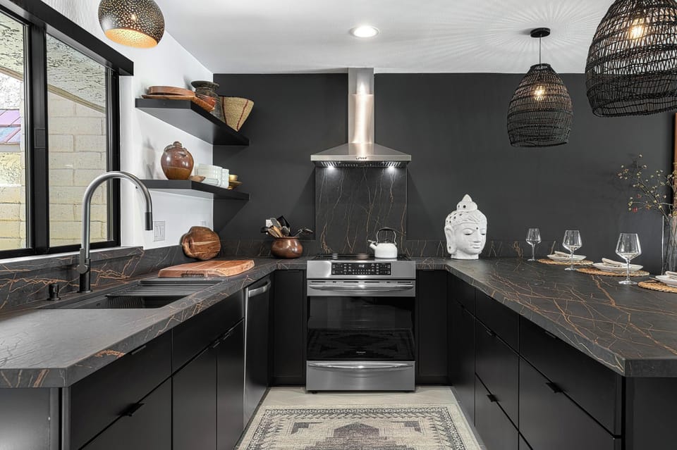 Step into a chef’s paradise in this modern kitchen, where functionality meets style. Equipped with stainless steel appliances, sleek countertops, and ample cabinet space, it invites you to cook and gather with friends and family.