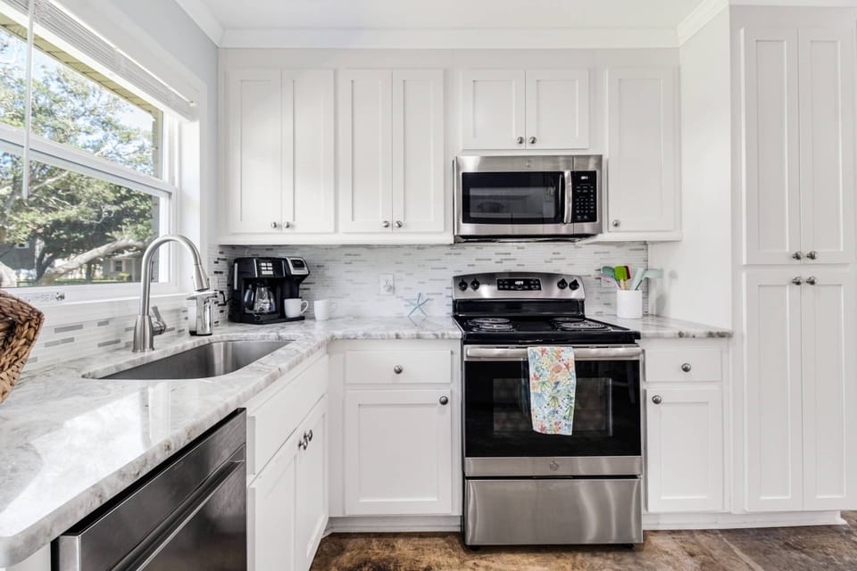 Small Appliances include: Drip & K-Cup Coffee Maker, Blender, Toaster, Crock Pot, Ice Cream Maker & Indoor Grill. Propane Grill in the Backyard.