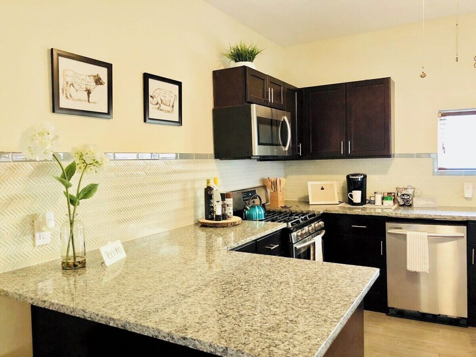 A well-furnished kitchen corner with all amenities to cook delicious meals.