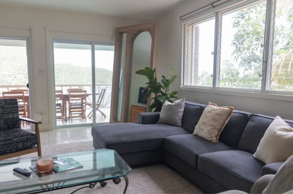 Comfortable seating in the spacious and well lit living room