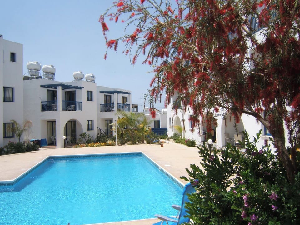 Relax by the pool private sunbeds and beach chairs provided