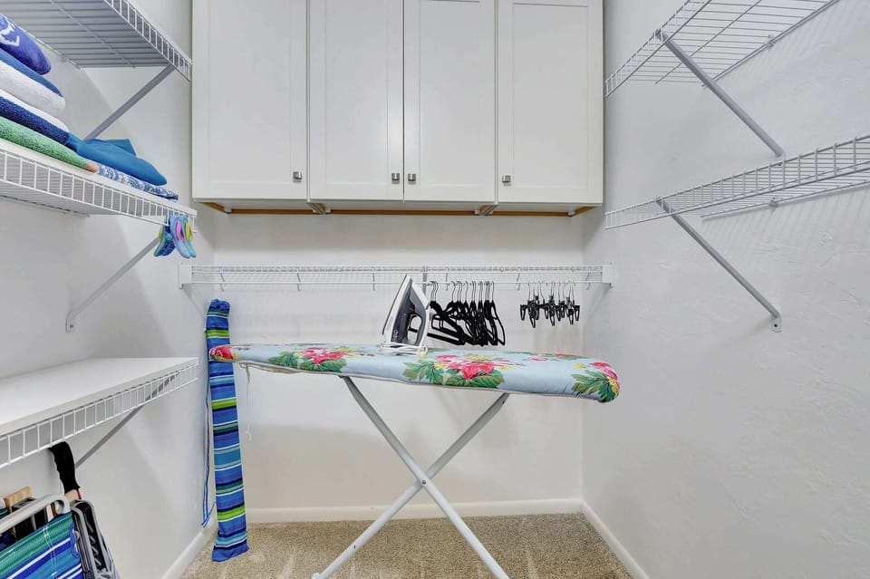 The large closet includes beach gear, the iron and board and still plenty of space for clothes and luggage