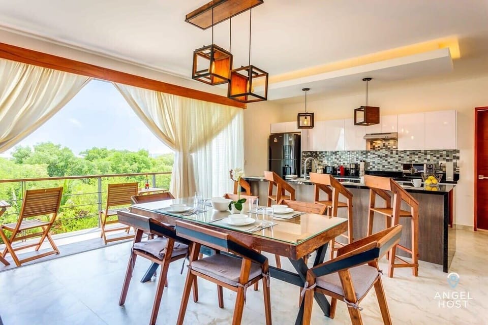 Open the glass sliders to extend the space to the outdoors & oceanview balcony!