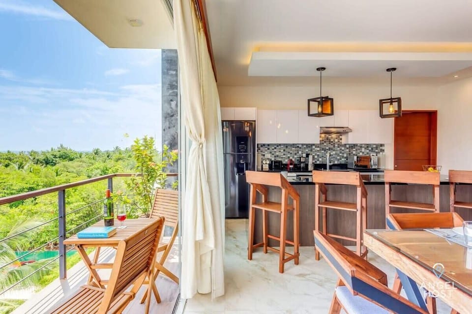 A great way to wind down with a view of the lush jungle & sea in the distance