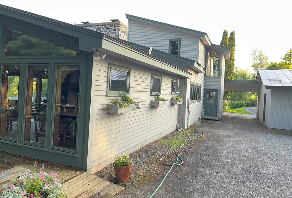 Parking Area for property and entrance (door by carport) and living room (near)