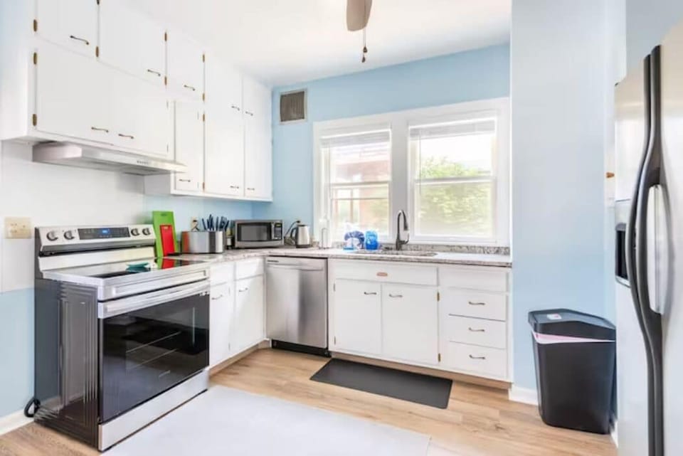 Fully equipped Kitchen, next to dinning room. New appliances,  granite counters.