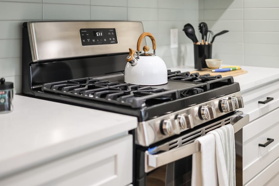 Kitchen - 5-burner gas stove with all the cooking amenities needed to cook delicious meals.