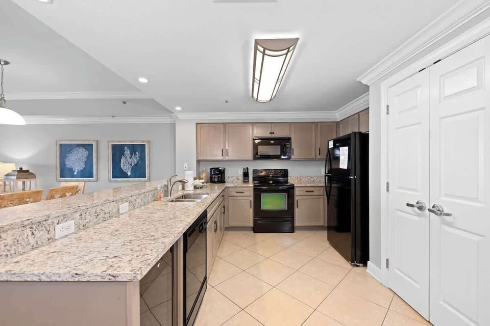 Spacious full kitchen with everything you need to prepare and serve meals!  Keurig coffee maker with coffee pot option, air fryer, crockpot, toaster and blender