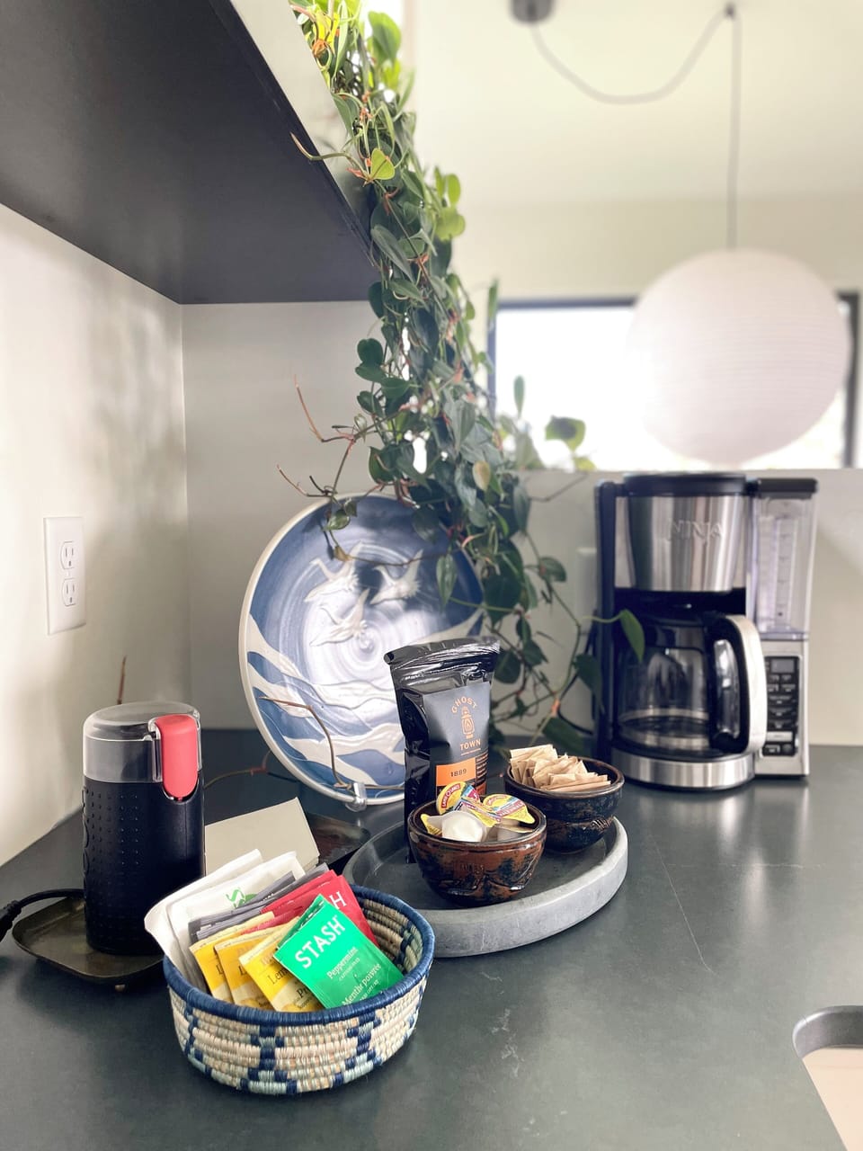 Tea, creamer, sugar, and local coffee