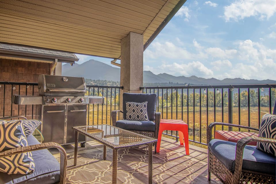 Private patio with stunning lake and mountain views.