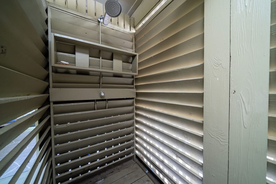 There's an outdoor shower to rinse off the sand and saltwater after a day on the beach.