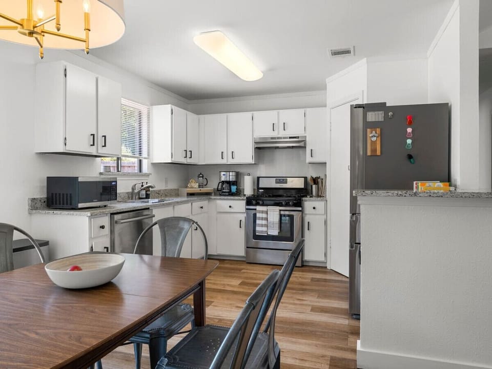 Cook up a feast in this fully-equipped kitchen, then gather around the dining table for a perfect meal.