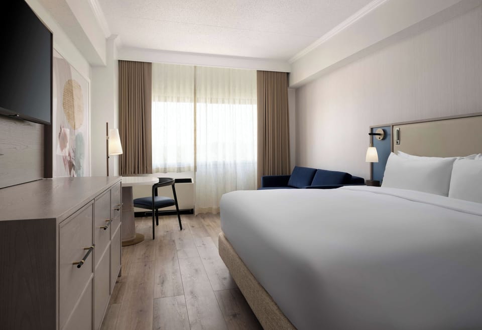 Settle into crisp linens and stream your favorites in comfort