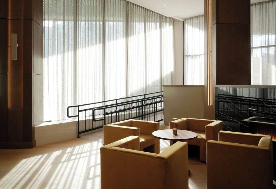 Settle into sunlit lounge seating for calm conversation and reading.