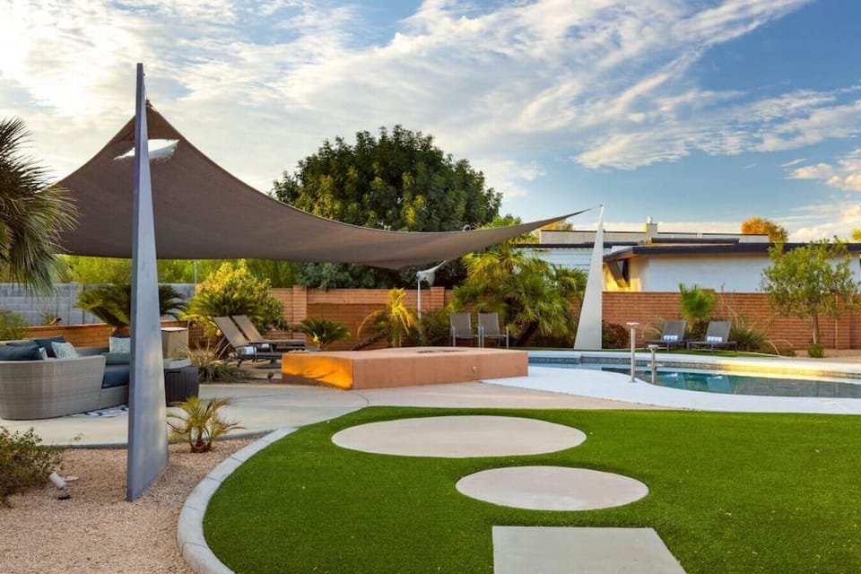 Enjoy a peaceful afternoon by the pool in our backyard garden!